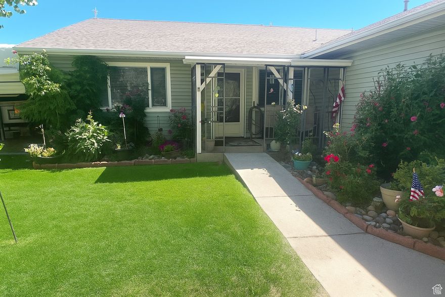 Charming one-level country cottage, with beautifully manicured grounds with mature shade trees. 3 bedrooms and 2 bathrooms, with a spacious master suite, a walk-in closet and a luxurious master bath with both a jetted soaking tub and a convenient walk-in tub. Large, open kitchen-perfect for cooking, entertaining, and gathering with loved ones-alongside a versatile computer nook ideal for work or study. Cozy covered deck, where you can relax and enjoy the mountain views year-round. Located in town, close to schools.