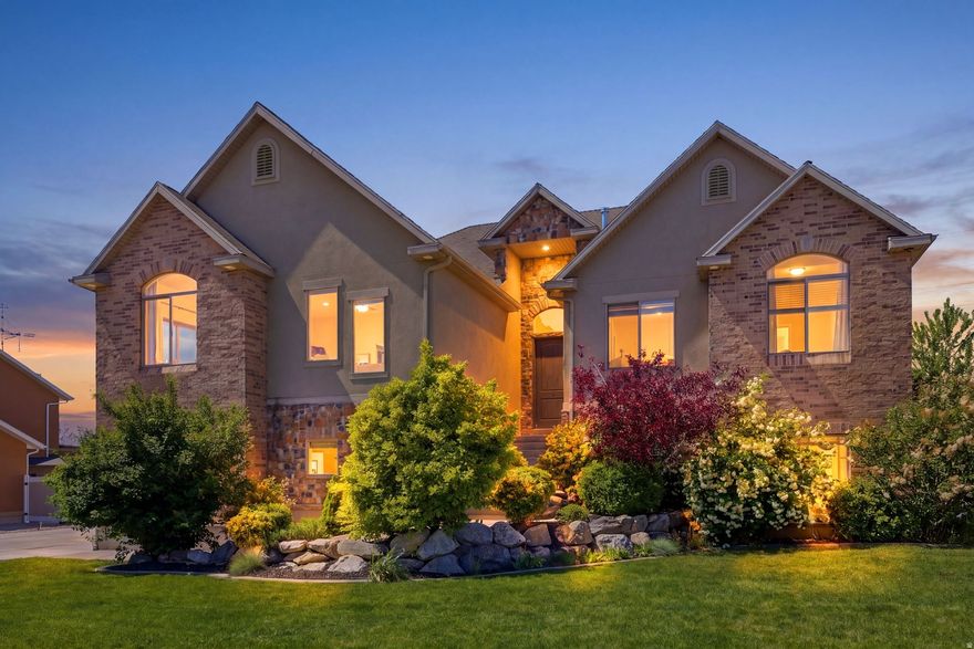 Light, bright and open, you will love this beautiful 6 bedroom, 5 1/2 bathroom home.  Located in the Farmington Ranches neighborhood, you will enjoy both mountain views as well as spectacular sunset views from this home.  The home features a spacious kitchen with white cabinets, stainless steel appliances and quartz counter tops.   A great room off of the kitchen with a fireplace and vaulted ceilings.   A covered deck is located just off of the kitchen with views out to the west. A primary suite that is large enough for a king sized bed, a primary bathroom with a double vanity, separate shower and jetted tub and a walk-in closet.    There is an additional more casual family room on the main floor that is perfect for large gatherings.   There are four additional bedrooms and two more bathrooms on this main floor. Downstairs you will enjoy the light and open feeling that the daylight and walkout basement provide.   No window wells in this home.  Everything is above grade.   A wet bar with a cook top is connected to the family room along with a lot of extra space for game tables etc.  Surround sound and built in speakers are all ready for your entertaining.  One bedroom with an on-suite down in the basement.   Tankless water heater, epoxy floors in the garage, generous RV Parking space for any toys that you may have, a flat backyard that is fully fenced a number of fruit trees. All of this with the convenience to Station Park outdoor mall and restaurants and highly rated schools.  An easy 25 minute commute to downtown Salt Lake or the international airport.