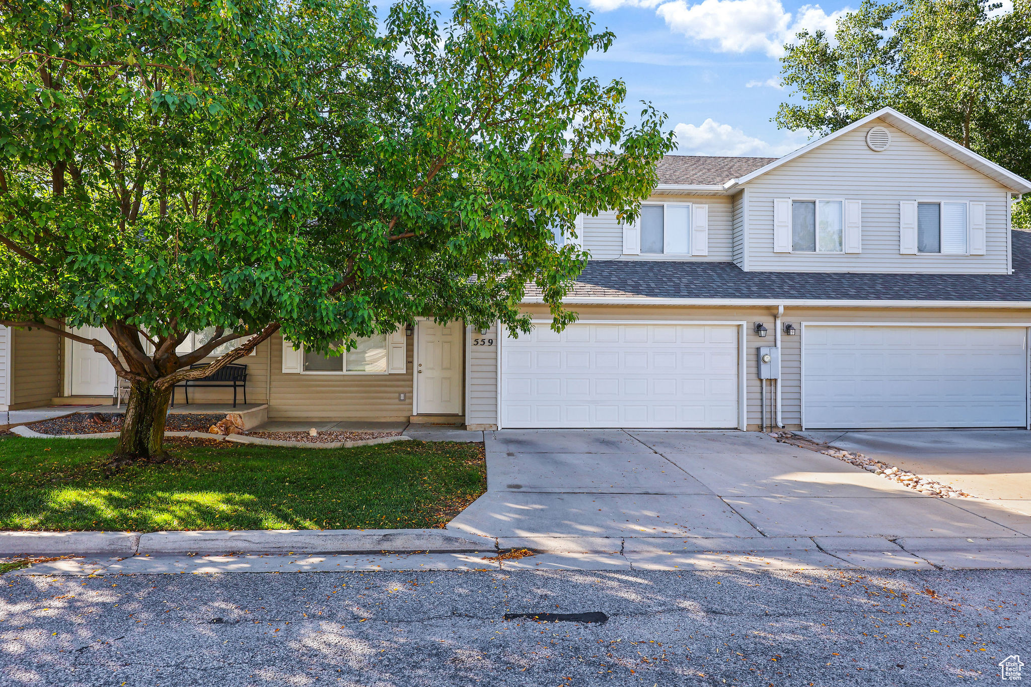 Tucked on Ogden's north end in the Grand Teton community, this well-cared-for 2-story townhome blends smart updates with a super convenient location near shopping, schools, transit, and trailheads. Inside, a bright, open main level features a spacious kitchen with pantry and newer range & refrigerator and a brand new dishwasher. Plus main-floor laundry and a half bath with updated tile/laminate flooring. Upstairs, the primary suite includes a walk-in closet and direct access to the full bath-upgraded with a high-end jetted walk-in tub/shower. Outdoor living shines with a backyard patio pergola, perfect for relaxing or entertaining. Community perks include a new roof (2024), full landscaping with sprinklers, and an HOA that covers water, sewer, garbage, yard care, and snow removal. Move-in ready, practical, and low-maintenance living in a location that makes daily life easy. (Owner-occupied community; see HOA for pet rules.)