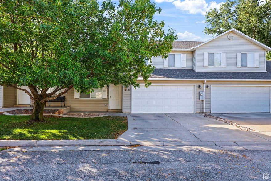 Tucked on Ogden's north end in the Grand Teton community, this well-cared-for 2-story townhome blends smart updates with a super convenient location near shopping, schools, transit, and trailheads. Inside, a bright, open main level features a spacious kitchen with pantry and newer range & refrigerator and a brand new dishwasher. Plus main-floor laundry and a half bath with updated tile/laminate flooring. Upstairs, the primary suite includes a walk-in closet and direct access to the full bath-upgraded with a high-end jetted walk-in tub/shower. Outdoor living shines with a backyard patio pergola, perfect for relaxing or entertaining. Community perks include a new roof (2024), full landscaping with sprinklers, and an HOA that covers water, sewer, garbage, yard care, and snow removal. Move-in ready, practical, and low-maintenance living in a location that makes daily life easy. (Owner-occupied community; see HOA for pet rules.)