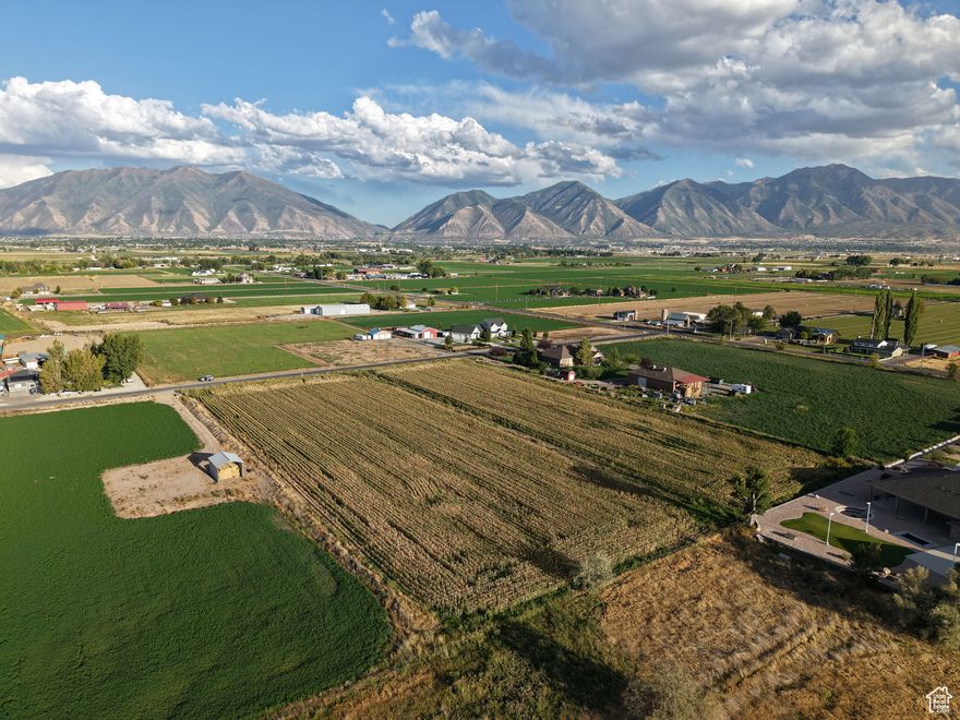 Own your private 5.94 acre mountain estate! 360 views of Timpanogos, Loafer & Nebo. Minutes to shopping & schools. Equestrian-zoned, level w/water rights. Build your dream home + ADU! Utilities ready. County approved, build NOW! It is conveniently located and offers an ideal setting for your dream home and hobby farm. Property is currently in greenbelt. Whether you're interested in building a new residence or continuing farming activities, this property is perfect for both. This is more than just a property; it's a lifestyle. Your Dream Home Awaits: Endless Possibilities: Bring your vision to life with your own builder, or consider a legal accessory dwelling unit for rental income. perfect for cultivating crops or creating your own private oasis. Conveniently Located, Yet Secluded: Enjoy the tranquility of rural living with easy access to city amenities. Minutes from Shopping: Costco, Walmart, and Sam's Club are just a short drive away. Utilities Ready: Natural gas and electricity are already installed at the street. This is your chance to own a slice of Utah's natural beauty. Don't miss out on this exceptional opportunity. Call today to schedule a private tour and see why this is the perfect place to build your dream home.