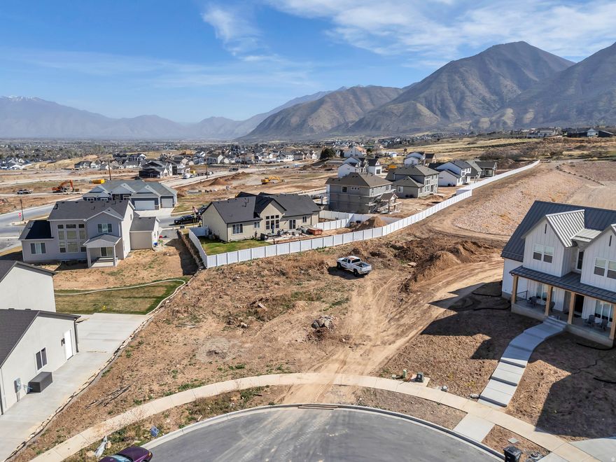 Build your dream home on this large luxury lot tucked in a quiet cul-de-sac in Salem. Enjoy stunning mountain views in a peaceful, well-located setting. We've partnered with some of the best builders in the valley as preferred builders to help bring your vision to life. The lot is build-ready with utilities available, making it a smooth and efficient process to get started.