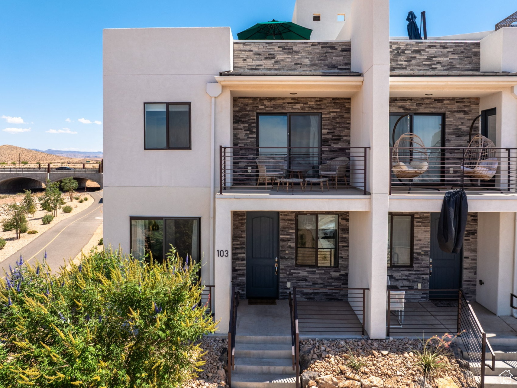 Discover the opportunity to own a 1/8th share of this fully furnished end-unit, three-story condo in the sought-after Desert Color community. This property offers resort-style living with access to two pools, a 2.5-acre lagoon, and a private spa area exclusively for this section of the neighborhood. Desert Color is rapidly growing, with new shopping, dining, and entertainment options nearby, including a Smith's grocery and a new movie theater and Costco coming soon. This home stands out among others in the building. As an end unit, it features more natural light, a private owner's closet, and every bedroom includes its own ensuite bathroom. The condo includes three bedrooms, three bathrooms, a half bath, and a loft-style entertainment space with extra sleeping accommodations. The home sleeps 12 comfortably plus consists of a pull-out queen sofa bed. The kitchen comes thoughtfully and fully equipped, including an upgraded induction stove and convection oven. Two private decks create inviting spaces for relaxing or entertaining. Square footage figures are provided as a courtesy estimate only. Buyer to verify all. The agent is the owner.