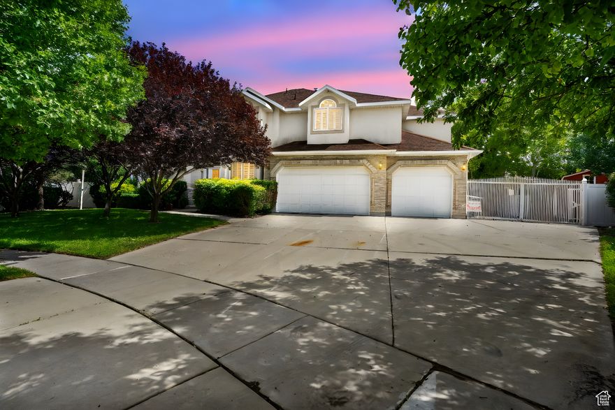 * Back on the market, buyer backed out * Don't miss this stunning and spacious 2-story home in West Jordan.  New carpet and new paint, this well-maintained home offers 7 bedrooms, 4 bathrooms and a full basement with a mother-in-law suite - perfect for multi-generational living!  You'll love the welcoming entry with a grand sweeping staircase, elegant bay box windows, and plantation shutters.  The home features 9ft ceilings on the main level, a formal living room, family room, den/office, and a large kitchen.   With a second kitchen in the basement.  Tons of RV parking for the toys as well. The master suite is a true retreat with vaulted ceilings, a jetted tub, and a spacious walk-in closet.  The basement includes a separate entrance and offers fantastic space with full amenities.   Enjoy the beautifully landscaped yard with a private garden mature trees and a large patio - perfect for entertaining.  Did I mention the ADU, ADU, ADU!  Square footage figures are provided as a courtesy estimate only and were obtained from a county records.   Buyers are advised to obtain an independent measurement.  * Preferred lender offering 1% toward closing costs or rate buydown.  Please contact agent for details *