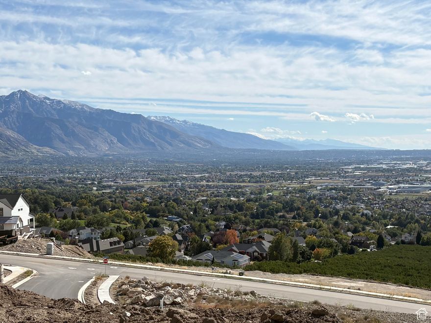 Nestled High on the Beautiful Pleasant View Bench, this stunning 0.40-Acre lot showcases sweeping Mountain and valley views along with breathtaking sunsets. The property offers the perfect setting for a custom home designed to highlight the area's natural beauty and serene surroundings. Enjoy the peaceful atmosphere while being just minutes away from hiking trails, skiing, parks, and local conveniences. This rare view lot provides an exceptional opportunity to build your dream home in one of Pleasant View's most desirable locations.