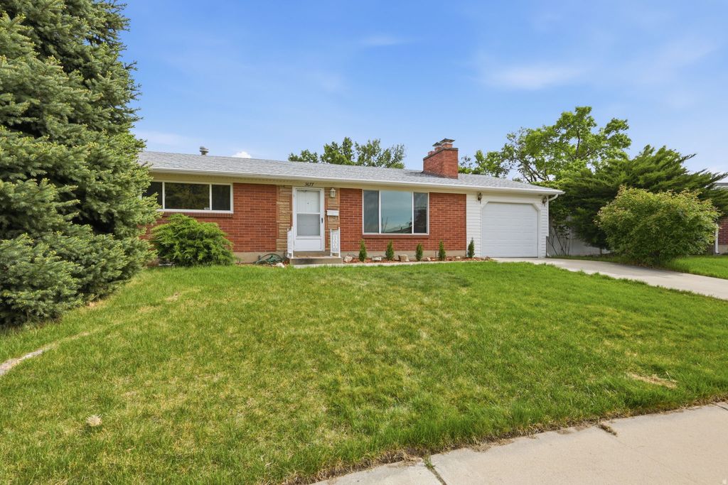 Photo of 3677 W KEWANEE DR, West Valley City, UT 84120 (MLS # 2153536)