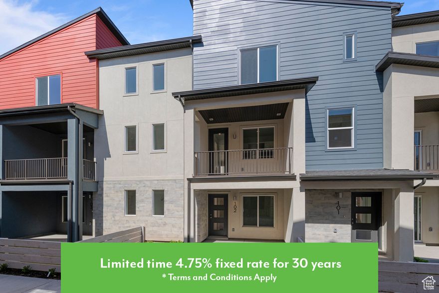 **Garbett Homes is offering buyers up to 6% on select ready to move in homes. Hurry because this incentive is for a very limited time. Please call for details.** Enjoy unbeatable convenience with quick access to I-15, I-215, downtown Salt Lake City, and the airport-all just minutes away. Walk to nearby parks, schools, and the scenic Jordan River Trail, or take advantage of community amenities including a central park, BBQ area, and abundant guest parking.  Step inside to an open-concept floor plan that feels both stylish and welcoming. Soaring cabinets in a bold, moody finish anchor a spacious kitchen built for gathering, while large living and dining areas flow seamlessly to a generous private balcony-perfect for relaxing or entertaining.  Oversized windows throughout the home invite in abundant natural light, while a fenced-in front yard offers privacy and additional outdoor space. Built with sustainability in mind, this home features enhanced insulation, high-efficiency windows, instant hot water, solar-ready wiring, and a private garage with EV outlet-designed to deliver long-term comfort and savings.  Don't miss the opportunity to own a thoughtfully designed, energy-smart home in one of the most accessible and vibrant areas of the valley. This one is a must-see.