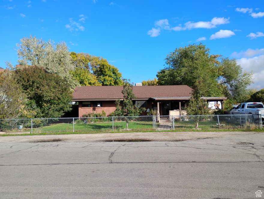 This midcentury modern located in Millcreek Utah is just the place to create your perfect home. This home is for the one that wants to create their own amazing space, with 3 bedrooms 1 bath and a large lot, you could make this into a stunner. Large picture windows open up this home with wonderful natural lighting. Large lot with plenty of room to expand, this one level property gives all the options imaginable. Don't miss out on this one. Lot# 16-32-352-032 is included in the sale. Property being sold as is. Listing agent related to seller.