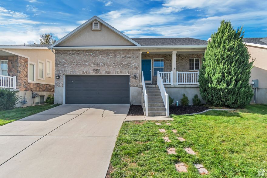 Welcome to this beautifully updated South Jordan home set in the sought-after Oquirrh Park community. Inside, a bright open layout connects the kitchen, dining, and living areas, creating an inviting main level perfect for everyday living and entertaining. The kitchen has been tastefully updated with new cabinetry, sleek countertops, and a 36" Thor electric range with a vent hood. The primary suite features a walk-in closet and an ensuite bath with a separate tub and shower, while two additional bedrooms, a full bathroom, and the laundry room complete the main floor. Downstairs offers impressive flexibility with a second kitchenette and dining area, a spacious family room, two more bedrooms, and a full bathroom-ideal for guests, extended family, or multi-generation living. Step outside to a huge, fully fenced backyard with raised garden boxes, a 4x6 shed, and ample room to play, gather, or grow your own produce. With all-new laminate flooring, fresh paint throughout, and an attached two-car garage, this home is move-in ready. As part of the Oquirrh Park community, residents enjoy access to a swimming pool, clubhouse, gym, and playground-all in a prime South Jordan location close to parks, schools, and shopping.