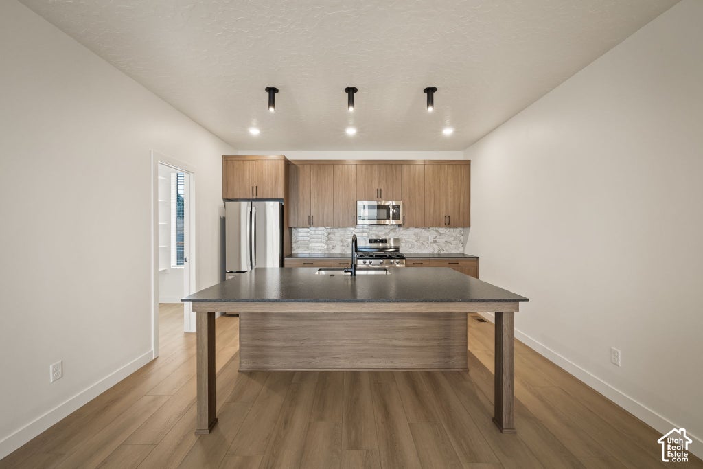 Photo of 4046 S SANDRIDGE DR W #3, Roy, UT 84067 (MLS # 2192379)