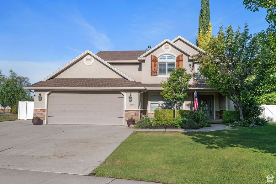 Beautiful Farmington home nestled on a quiet cul-de-sac. You will love this spacious 1/3 acre+ lot with no backyard neighbors, featuring a fire pit and large patio perfect for entertaining, playset, garden boxes, greenhouse, a large RV pad, all backing to a private park. Walk into the bright, open kitchen with an extra-long island, quartz countertops, double oven, hardwood floors, and plantation shutters. Enjoy the vaulted master suite with tiled shower, jacuzzi tub, double vanity sink, and walk-in closet. Extras include a full office with french doors and a closet, water softener, built-in garage shelving, tankless water heater, and radiant floor heating. Walking distance to Eagle Bay Elementary & Farmington Ranches Park with quick access to Davis Corridor, I-15, and dozens of shopping and dining options. Come see it today!