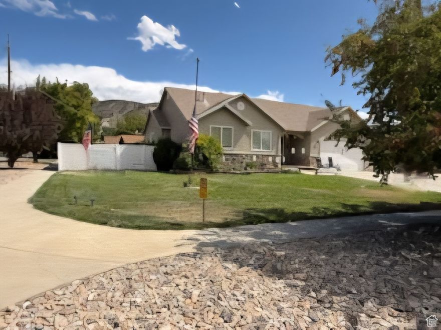Seller willing to look at all offers! Don't miss out on this incredible opportunity! Charming ranch-style home situated on a large corner lot in Nephi. Home would be great for first-time homeowners, retirees or investors.  Welcome to your dream home, a stunning ranch-style property that combines comfort, style, and potential in the unfinished basement. This home boasts a variety of desirable features that make it perfect for families, investors, or anyone seeking a welcoming and versatile space. Enjoy the expansive feel of this property with its prominent corner position. The yard is beautifully designed and maintained, offering a lush and inviting outdoor space.  The automatic sprinkler system keeps the landscape green and beautiful. The huge concrete driveway and parking area provides plenty of space for multiple vehicles and easy access to the home. The concrete parking area can even hold large vehicles. The highlights of the Living Room feature a stunning vaulted ceiling that enhances the spaciousness and airiness of the room. There are plenty of smaller ceiling fans in the living room which helps keep the house cool. The dining area is perfect for family meals or entertaining guests, with easy access to the kitchen. The gorgeous, updated kitchen is modern and functional, equipped with the latest appliances and ample counter space for all your culinary adventures. There are three spacious bedrooms and each bedroom offers a comfortable retreat with plenty of natural light. Includes two full bathrooms which are conveniently located and designed for comfort and style. Additional features include a Central Vacuum System which makes cleaning a breeze throughout the home both on the main level and in the basement. The large, covered patio is ideal for outdoor dining or relaxing, regardless of the weather. The attached two-car garage provides secure and convenient parking along with storage. The walkout basement offers easy access to the backyard and an opportunity to expand your living space or possibly use as an accessory dwelling unit (ADU). The unfinished basement is ready for your personal touch, whether you envision a home gym, entertainment room, or additional bedrooms. The newer furnace and gas water heater ensures efficiency and peace of mind. The property offers an investment opportunity, especially with the large unfinished basement that offers endless possibilities for customization and increased property value. This comfortable ranch-style home is not just a place to live; it's a chance to create the lifestyle you've always wanted! Square footage figures are provided as a courtesy estimate only and were obtained from Juab County Tax Records. Buyers are advised to obtain an independent measurement to ensure accuracy.