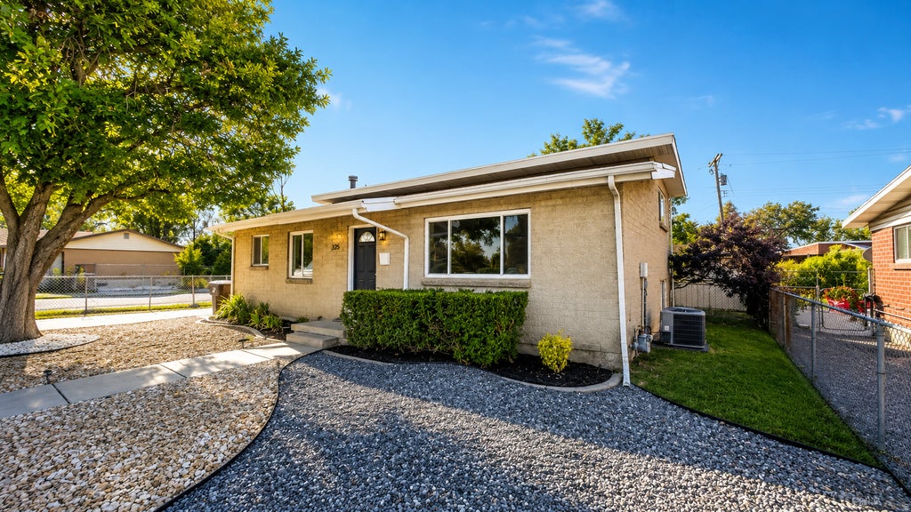 Photo of 325 W PRINCETON DR, Midvale, UT 84047 (MLS # 2177468)