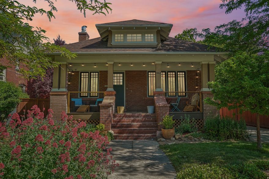 Nestled on a quiet, tree-lined street, this storybook bungalow blends timeless charm with thoughtful updates throughout. Rich in character and elevated with modern finishes, the home features quartz countertops, custom cabinetry, etched glass accents, and a cozy dining nook that feels pulled from the pages of a design magazine. The spacious layout offers 3 bedrooms and 3.5 baths with flexible living spaces that work equally well for entertaining, hosting guests, or everyday living.  2 car garage and yard space to let loose outside. South facing natural light fills the home with warmth and energy.