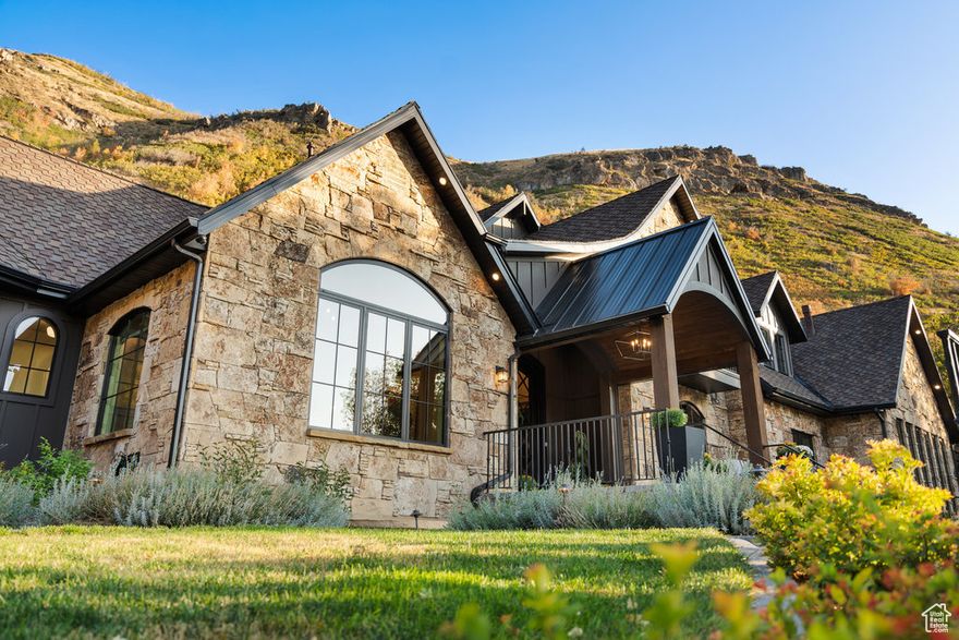 Spectacular Mountain Retreat at the mouth of #HobbleCreekCanyon in #SpringvilleUtah . "The Phoenix" has been completely renovated. Down to the studs. It was in the #ParadeofHomes 2023. You will feel the ZEN as you step foot on the property, but then when you enter, you will experience it...Peace. Healing. Beauty. Calm. This is a very special place. There are really too many beautiful finishes to name them all, but here are a few: You approach the home on radiant heated  paver walkways and driveway. The grand entrance is graced with a stunning Bronze sculpture of a phoenix after which, the home is named for: "The Phoenix at Hobble Creek". Rough timbers welcome you in. Gorgeous views of the scenery from every window. The den and the dining look out onto the Pheonix and the valley. Beautiful gathering area leads out to a private patio with an outdoor kitchen, fireplace, sauna, hot tub, and fire pit. The property reaches up very high as you look up to a gorgeous rock formation, and then it extends down to the creek and even across at some points. Plenty of parking. for parties! Parking for 22+/- cars.  ADU/apartment with an outside entrance and conservatory. Even you own ELEVATOR! Theater room, bunk room and basement kitchen with basement entrance and access to additional garage. Cutting edge water filtration system for the whole house.  The Primary suite is on the main level with a door out to the jacuzzi and the sauna. Lower garage was excavated and added at the time of renovation.  Timeless yet rustic yet elegant yet cozy. Hard to envelope all of these vibes into one home. Most all furniture is negotiable. *Video for the home: https://sites.listvt.com/vd/213589646 *website for the home: https://sites.listvt.com/public/photos/213329326