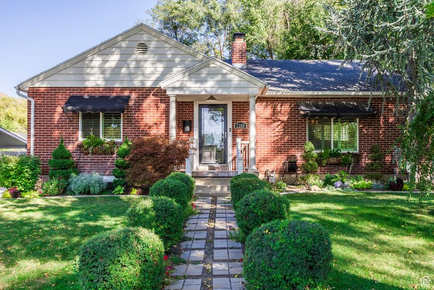 Live the Sugarhouse lifestyle in this charming red brick bungalow on a quiet tree-lined street at 2285 South 1900 East. Inside, timeless details like original hardwood flooring and plantation shutters blend beautifully with modern upgrades, including a white kitchen with granite countertops, white subway tile and stainless steel appliances where your kitchen sink looks right out to your back yard. Host summer dinners on the oversized deck that is covered and vaulted with ceiling fans so you can enjoy year round. On the main floor you will find oversized spaces for this area, a formal living room, a formal dining area and two generous bedrooms. On the lower level you will find two more great bedrooms, each with an egress window, a family room that is flexible to have another dining space and features a stylish kitchenette with beverage fridge, microwave and ice maker. In this area a tv is included which is perfect for game nights or when a guest stays. Other features include: new water main, LED canned lighting added, double pane windows throughout, a beautiful gas fireplace, Terry Rampton Interior Design has curated a custom color of paint in the home and crisp white wainscoting, as well designing the family room and kitchenette down. The large 2-car garage offers bonus storage for your gear with the width and extra room above the entire length of the garage. The location is fabulous, near Sugarhouse Park, the new 21st & 21st and Foothill Village renovation with easy access to the freeway to head to the canyons for world class skiing, hiking and biking, the Salt Lake International Airport, Park City and downtown Salt Lake City.