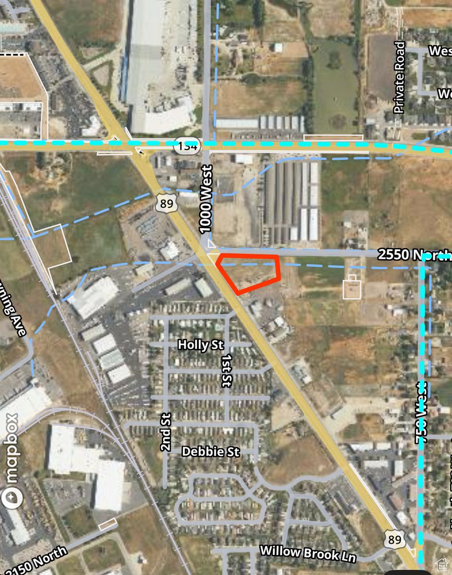 Very Nice!! 2.6 Acre corner piece of commercial property Zoned CP-2 in Harrisville.  Great exposure Frontage on Hwy 89 as well as 2550. centered in existing and new commercial and residential growth area. Very close proximity to front runner and I-15. For the reasons listed and and many others this is a great piece of commercial property.  Call or text anytime for more information or details.
