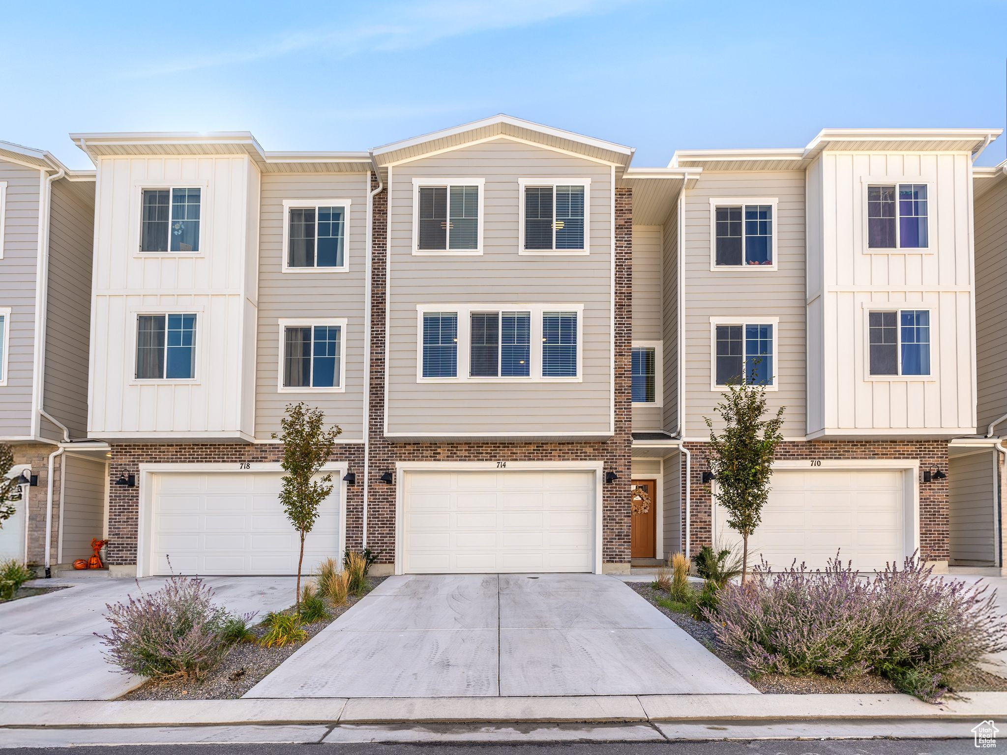 Welcome to this beautiful 3-bedroom, 2.5-bath townhome in The Towns at Brylee Farms! Built in 2024, this 2,555 sq ft home offers modern style and functionality in a thriving Eagle Mountain community. Enjoy an open floor plan with a spacious great room, large windows, and beautiful finishes throughout. The kitchen features quartz countertops, ample cabinetry, and included dishwasher, microwave, and stove. Curtain rods and curtains in the master and small bedroom are also included. The 4 car garage features a home gym, and the mounted mirrors may stay upon request. Upstairs includes a roomy primary suite with walk-in closet and private bath. The unfinished basement provides space to grow or customize. It is the perfect space to finish a mother in law apartment. Energy-efficient design with double-pane windows, central air, and forced-air heating. Community amenities include a clubhouse, pool, playground, picnic area, and pickleball and tennis courts. This home is a short sale and is subject to third party approval. Buyer to verify all information.