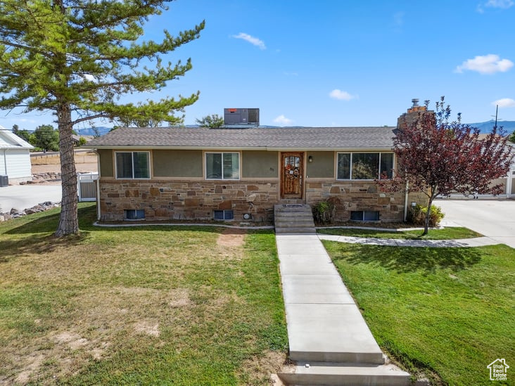 PRICE REDUCED TO $399,,900 FHA assumable loan at 3.125 % Call for details !! This home has the perfect set up to not only accommodate the toddler, it is also set up to accommodate the fussiest of teens wanting their own private space--here we've got you covered! Professionally designed & installed high vinyl fence with new sprinkler system, sod, barbecue pit and 2 storage sheds to store all of your summer furniture makes this back yard with newly installed sprinkler system a hidden sanctuary!! Home has a newer gas fireplace, newer gutters, custom kitchen cabinets, custom cement countertops and adorable updated main floor bathrooms and lots of basement storage. Square footage figures are provided as a courtesy estimate only and were obtained from Sanpete County. Buyer is advised to obtain an independent measurement. SELLER REQUESTS 24 HOUR NOTICE FOR SHOWING APPOINTMENTS.