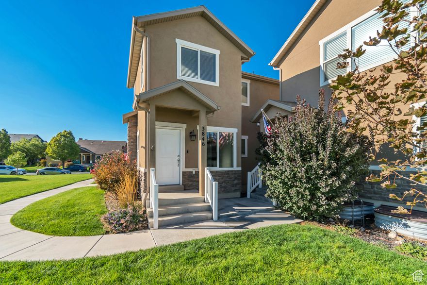 Enjoy laminate floors, an open kitchen with quartz counters, stainless steel appliances, and a large corner pantry. The master suite features a large walk-in closet, dual sinks, quartz counters, and a separate tub/shower. Includes two spacious bedrooms, an unfinished basement, and a large 2-car garage. Front door faces the Ranches Golf Course!