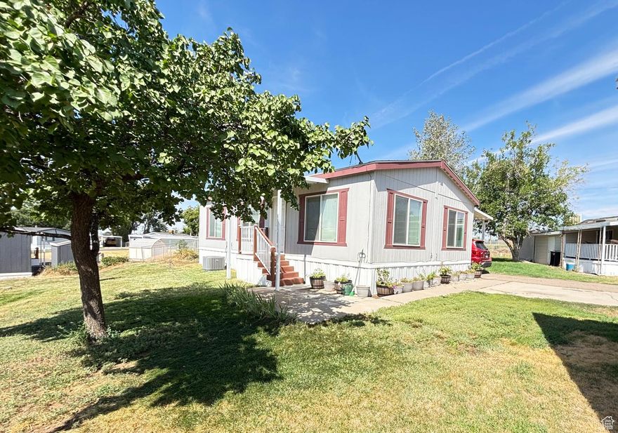 SELLER OFFERING $5,000 in COCESSIONS if the offer is full price. Beautiful 2021 Fleetwood double-wide manufactured home in Rolling Hills Estates, Layton. This 2-bedroom, 1-bath home offers 960 sq. ft. with an open-concept living and kitchen area, perfect for entertaining. Features include central A/C, a shed, and kitchen appliances (fridge, range, dishwasher). Community amenities: pool, clubhouse, playground, picnic area, extra parking, and RV storage.  The sale is for the home only; land is not included. Buyers must be approved by the community before submitting an offer.