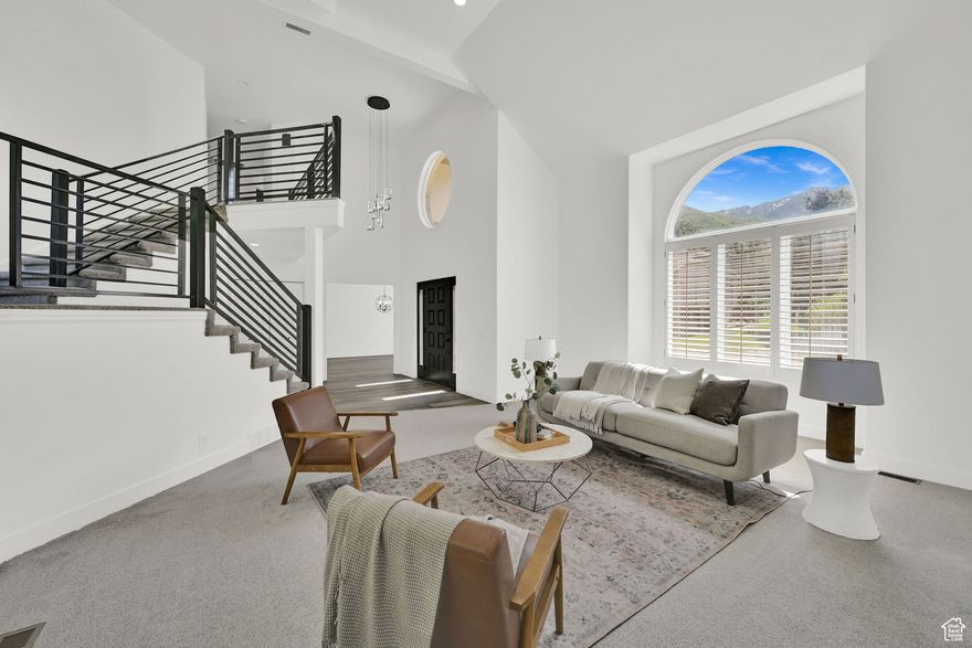 **Come see it before the beautiful staging is gone on Friday November 21st ** Welcome to this beautifully updated residence in the highly desirable Mountain Meadows community. Thoughtfully upgraded throughout, this spacious home offers comfort, functionality, and peace of mind. Step outside to take in breathtaking mountain views, complemented by a three-tiered waterfall and an additional tranquil water feature just outside the back door. A secluded patio provides an ideal setting for outdoor dining, or simply unwinding in privacy. The expansive three-car garage offers ample space for vehicles, toys, and additional storage. Inside, you'll find two AC units and two furnaces to ensure year-round comfort and efficiency. A gas generator to put your mind at ease when the power goes out. The open-concept kitchen and living area seamlessly flow to the outdoor patio, creating an inviting atmosphere for gatherings. The primary suite is a true retreat, filled with natural light and featuring a spa-inspired bathroom you must see in person. Upstairs, two additional bedrooms each enjoy their own private vanities-perfect for guests or family members. The fully finished basement has four more bedrooms, a large workout room, and a generous family room, offering flexibility and space. This exceptional home truly has an all-luxury, space, and an unbeatable east bench location, all for under a million. Come experience it for yourself!