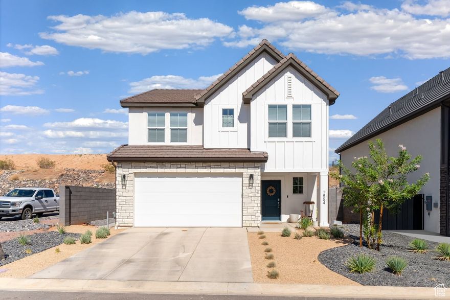 Newly built home in DR Horton subdivision, this Bryce Model features 4-bedroom, 2.5-bath home with a 2-car garage blends modern design and thoughtful details. The open-concept main floor features a spacious living area, dining nook, and kitchen with gas stove, large pantry, and plenty of counters and cabinets. Accent walls throughout add style, while a brand new water softener brings convenience. Upstairs, the master suite offers a walk-in closet and full bath, with laundry nearby. Outside, enjoy ridge views with no backyard neighbors, relax on the covered patio, or perfect your short game on the turf yard with putting green. Fully landscaped with a block wall for privacy, plus HOA amenities including a pool, sports courts, miniature golf, and park.