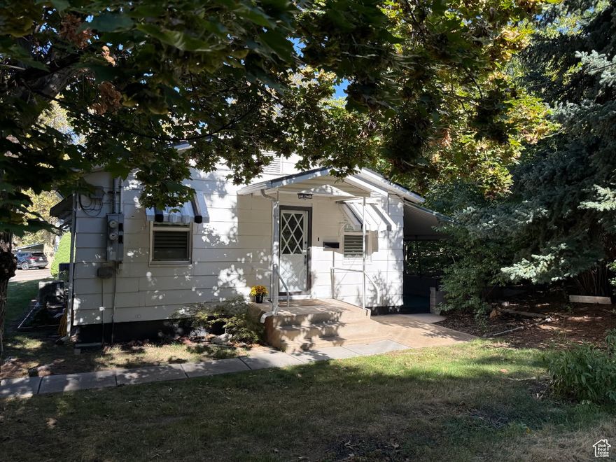 **Huge Price Reduction!** Darling home in Grandview Acres. Spacious layout open to a large price covered patio. The mature trees offer privacy and a serene setting to enjoy and relax!  Perfect if you are student at Weber State or working at the MaKay Dee Hospital. Close to everything. Easy access to hiking trails and ski resorts. Refrigerator, washer dryer and a brand new stove are included.  Roof was replaced a little over a year ago and paid for by the HOA. There are other improvements are slated. Move in Ready!!