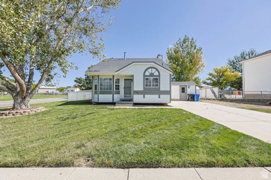 This charming home is warm and welcoming, offering a perfect blend of comfort and timeless elegance.  Nestled in an established neighborhood on a spacious corner lot with a cozy backyard oasis under the mature trees.  Enjoy the privacy of the fenced backyard and convenience of two storage sheds, both with running electricity. This well-kept home is move in ready and was just updated with brand new carpet, new stainless-steel refrigerator, microwave and oven, new furnace with updated ductwork and fresh paint! Newer kitchen backsplash and granite countertops, roof replaced approx. a year ago.