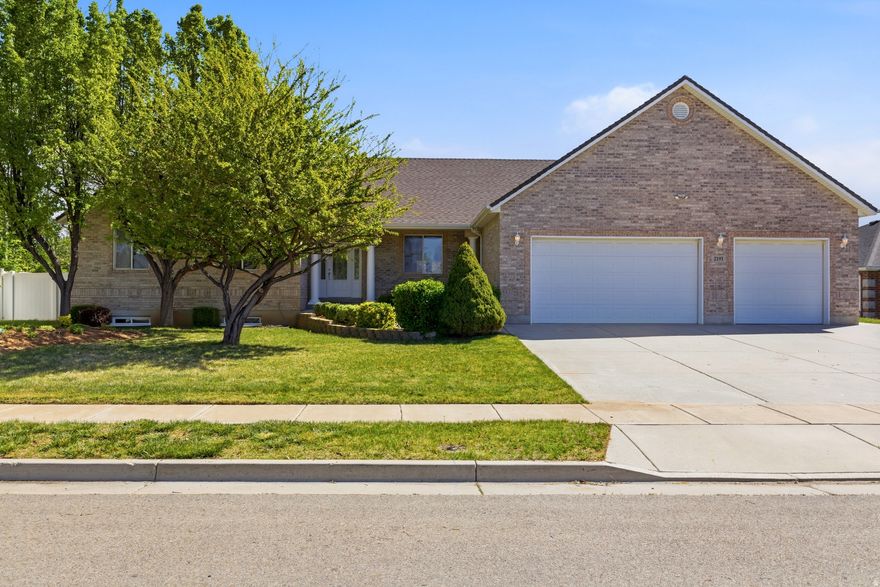 Welcome home to the highly sought-after neighborhood of Syracuse! This beautifully maintained, one- owner home offers convenient main level living with four bedrooms, 2.5 baths and an expansive light filled family room. The well-appointed kitchen features an oversized island perfect for baking & entertaining, walk- in panty, and abundant storage throughout. There is a large, finished room on one side of the basement that can be considered a flex space- (Bedroom, home gym, family room). Enjoy stunning mountain & park views from your backyard patio. *Additional highlights include a greenhouse, large workshop, and extra deep walk-in primary closet, two cold storage rooms, walk out basement, easy to maintain landscaped yard & thirty-year roof. This well- loved home truly combines comfort, functionality, and location! Don't miss your opportunity to make it yours!   Square footage figures are provided as a courtesy estimate only and were obtained from county records. Buyer is advised to obtain an independent measurement.