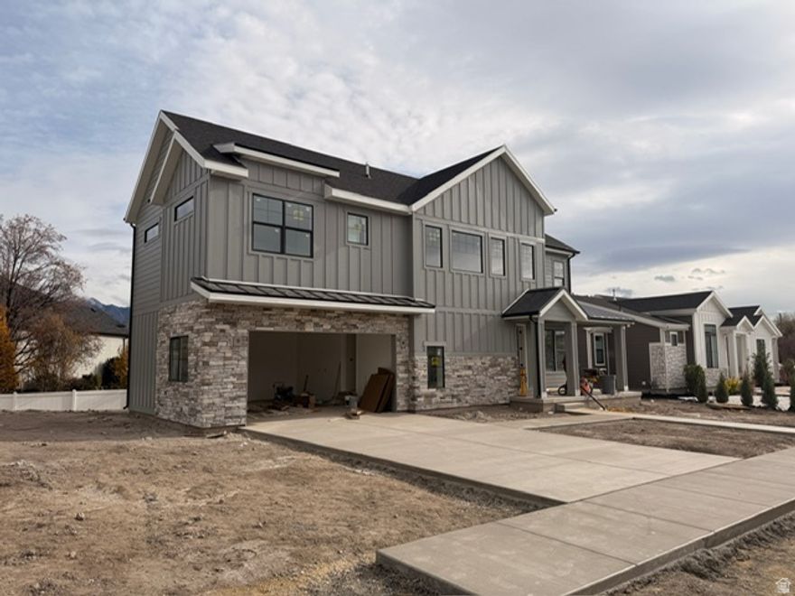 *ESTIMATED COMPLETION IS END DECEMBER 2025!* Tucked off 4800 South, Meadows on 48th features 33 brand new single-family and custom homes in a peaceful, private setting. With quick freeway access just minutes away, this location is as convenient as it is desirable. Built with attention to detail, this home offers luxurious living with an open floor plan, large windows that bring in natural light, and modern finishes throughout. The kitchen showcases quartz countertops, white craftsman-style cabinetry, stainless steel appliances, and durable laminate flooring. The spacious primary suite includes double sinks, a large walk-in closet, and a separate tub and shower for ultimate comfort. Photos are of another floor plan in the community-finishes may vary. Square footage figures are estimates from building plans; buyer to verify independently. *Some items shown in the photos-such as cabinetry, fixtures, etc-may be upgrades or not included in the sale. Photos may be of a different home. Please contact the listing agent for a detailed list of included features