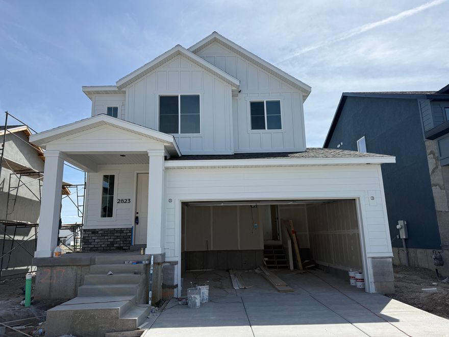 Welcome to the Tahoe floor plan in the highly anticipated JDC Ranch community in Plain City. This thoughtfully designed home offers 3 bedrooms, 2.5 bathrooms, and a functional layout with a clean, modern farmhouse exterior and timeless finishes throughout. Front landscaping is included, providing effortless curb appeal from day one. The unfinished basement offers a blank canvas, giving you the flexibility to create additional living space, a home gym, office, or whatever fits your needs. JDC Ranch is planned with lifestyle in mind, with future parks, walking trails, and playgrounds designed to make it easy to enjoy the outdoors right in your own neighborhood. The home is currently under construction and is estimated to be completed in approximately 45 days, offering a great opportunity to secure a new construction home without an extended build timeline. *AI generated photo included for comparison. Actual finishes, colors, materials, and final construction details may vary. Buyer to verify all information.*