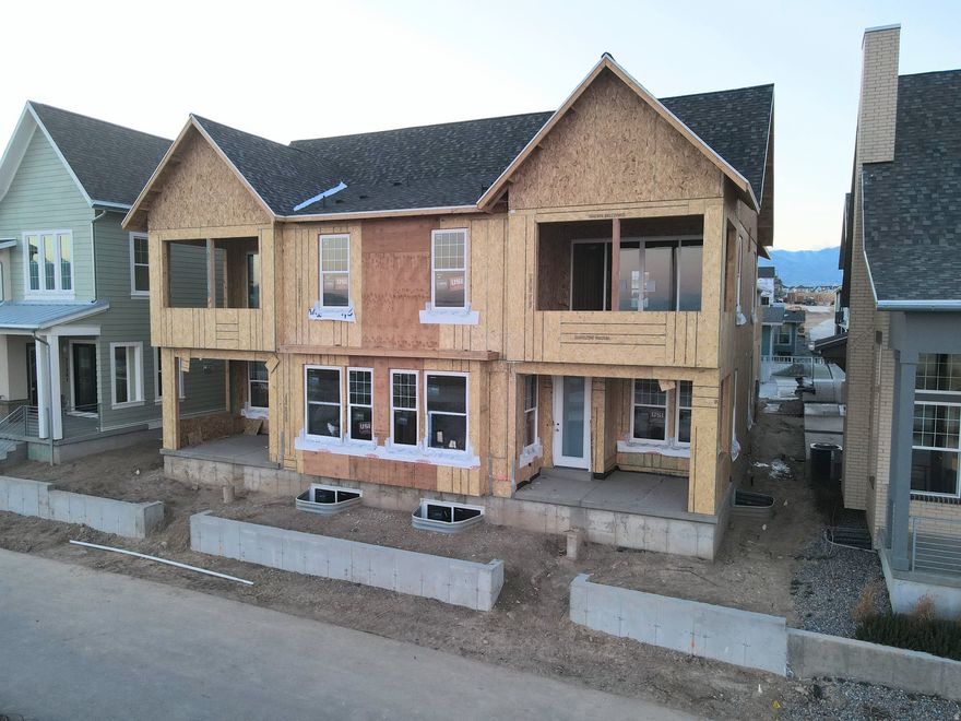 Brand New Floorplan on the Watercourse now with FINISHED BASEMENT! Enjoy waterfront living with this beautiful new home, just steps from incredible amenities including paddleboarding, kayaking, and scenic trails all with a low HOA fee. The home features a spacious front porch that opens into a generous great room, seamlessly connected to a modern kitchen with a large pantry. The impressive primary suite includes a private balcony, hot tub-ready, and a luxurious en-suite bathroom featuring a stand-alone soaking tub, separate shower, and a spacious walk-in closet. Price already includes Designer Upgrades and Options! Estimated Summer 2026 Completion *Interior finished photos are of similar plan for example purposes. Upgrades and finishes will vary*