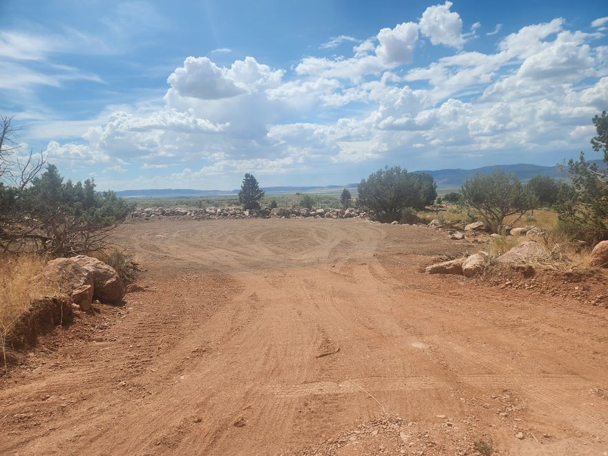 Beautiful, leveled lot in the trees looking east to the mountains above and west to the panoramic valley view. Power on Foothill Dr and water line in the street.
