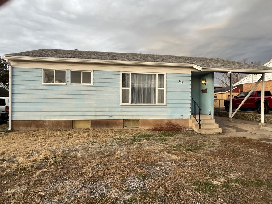 Looking for an affordable starter home with equity potential? This home is priced to sell. Clean 2 bedrooms 1 bath on main level of the home. There are wood floors under the carpet. Furnace replaced in 2025 adding A/C and a new water heater. Swamp cooler was removed professionally and roof repaired.  Insulation was added in the attic. Basement is partially finished. Some walls are up and painted.  Newer carpet in one of the Basement rooms with unfinished ceiling. Buyer could add closets and have one or two bedrooms in the basement. There is a basement bathroom with a latrine. Enough space in the bathroom to add a sink.  Agent related to seller.