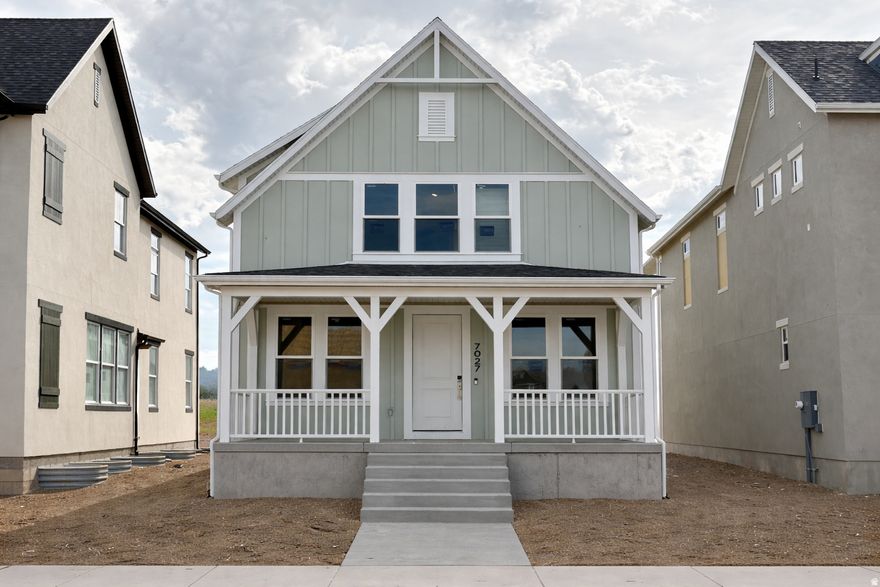 **April completion date! Rates as low as 3.50% with our preferred lender!!** Welcome to the Willowmere- one of Daybreak's popular Cottage Court floorplans. This property features a Farmhouse elevation and huge front porch for relaxing outdoors. It sits in an amazing location just down the street from The Watercourse, Daybreak's newest amenity. Inside, you'll love the open concept and inviting feel. Enjoy a dedicated mudroom with built in cubbies to keep your home pristine, a massive kitchen and large island perfect for cooking and entertaining, and a large pantry for all your essentials. Every room boasts walk-in closets, with an additional storage room upstairs, providing more than enough storage. The dedicated laundry room makes laundry day effortless, while the divided bath ensures privacy. A fully fenced private side yard provides privacy for outdoor enjoyment and room for the kids or dogs. Thoughtful upgrades include an expanded walk-in shower, soft-close kitchen cabinetry, quartz countertops, a gas range, pull-out trash drawers, and designer finishes throughout. Plus, with a 2-year builder warranty and a 10-year structural warranty, you'll enjoy lasting quality and peace of mind for years to come! Photo of side yard is from a previously built home shown as an example***Model Home Sales office located at: 6656 W Key Largo Way. Buyer and buyer's agent to verify all information.