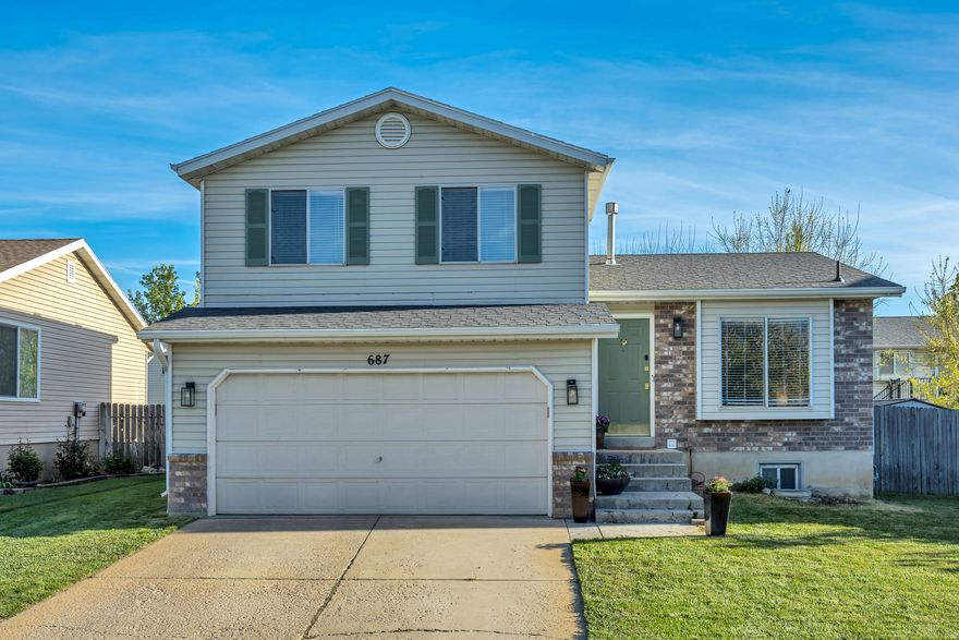 This lovely Tri- level home is light, bright and airy! Enjoy relaxing in the living room with a book next to the large window that brings in an abundance of natural light. The dining area is spacious and is perfect for entertaining or watching the kids closely as they play in the family room.  The patio and backyard are perfect for hosting a summer evening BBQ or playing ball with your pup. You will appreciate the convenient layout of this home along with peace of mind having a newer 50-gallon hot water heater and newer furnace. This peaceful community is well taken care of and is situated in the desirable Greenfields development. Located close to shopping, schools, and restaurants. Just minutes away from I-15 for easy access to downtown Salt Lake City, Hill Airforce Base, Salt Lake International Airport, Station Park in Farmington and much more! You had better hurry!