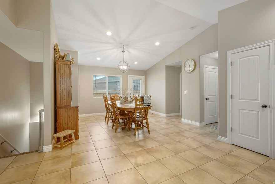 Welcome to a home that truly checks every box. Meticulously maintained and thoughtfully upgraded-including a high-efficiency tankless hot water heater. This 5-bedroom, 3-bathroom residence offers the perfect blend of modern comfort and functionality. The main level features a bright, open-concept living, kitchen, and dining area, alongside three spacious bedrooms and two full baths.  The fully finished basement is a true showstopper, featuring a massive second family room with endless possibilities for a home theater, gym, or playroom. You'll also find two additional bedrooms with expansive closets, a third full bath, and incredible storage solutions, including a dedicated cold storage room and a generously sized finished storage area.  The 2-car garage is fully finished and painted, featuring a unique overhead electric winch (included with the home) for heavy lifting. Outside, enjoy a private, fully fenced sanctuary complete with a manicured lawn, full sprinkler system, a built-in sandbox, and two storage sheds for tools and gardening. This home is a must-see!