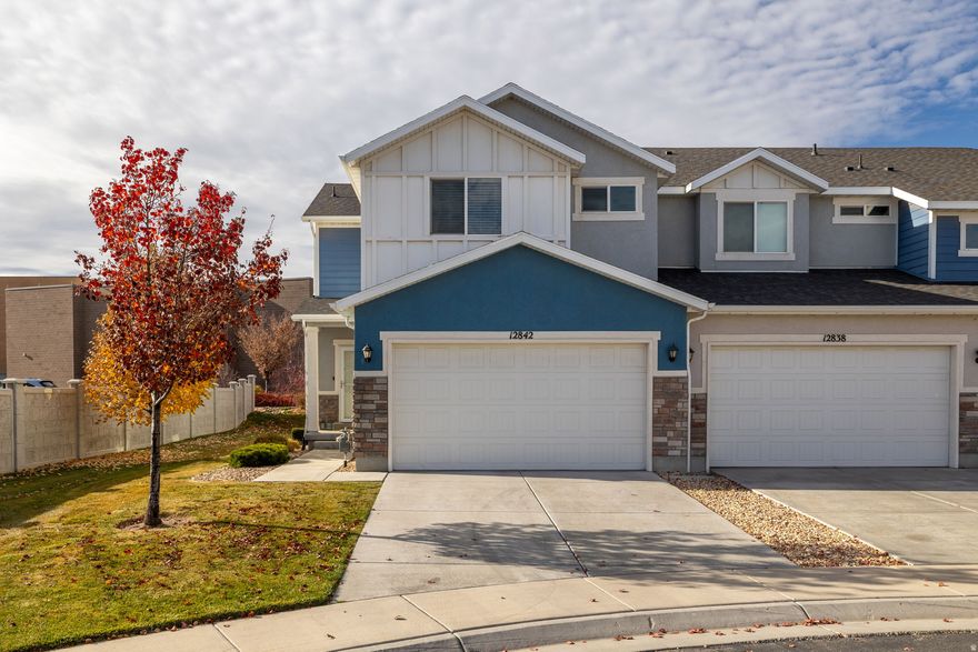 Tucked at the end of a quiet cul-de-sac in Herriman's Silver Crest neighborhood, this bright end-unit townhome has the kind of layout that simply works. Extra windows throughout bring in amazing natural light, giving every room a warm, open feel. The main level is inviting, with plenty of space to gather, cook, and unwind without ever feeling crowded. Upstairs you'll find a comfortable primary suite with its own bathroom and walk-in closet, plus two additional bedrooms, a full bath, and convenient laundry. The finished basement adds even more usable space, including a fully finished, rare-to-find full bathroom, along with an additional bedroom-perfect for guests, a playroom, or a quiet office. Outside, the yard features low-maintenance turf for greenery without the upkeep, plus a bit of privacy and mountain views. Thoughtful upgrades include keyless entry, reverse osmosis, a water softener, ceiling fans, insulated garage doors, overhead garage storage, and cold storage. With easy access to parks, schools, and the rec center, it's an easygoing, low-stress home in a spot you'll love coming back to. Come see it for yourself!