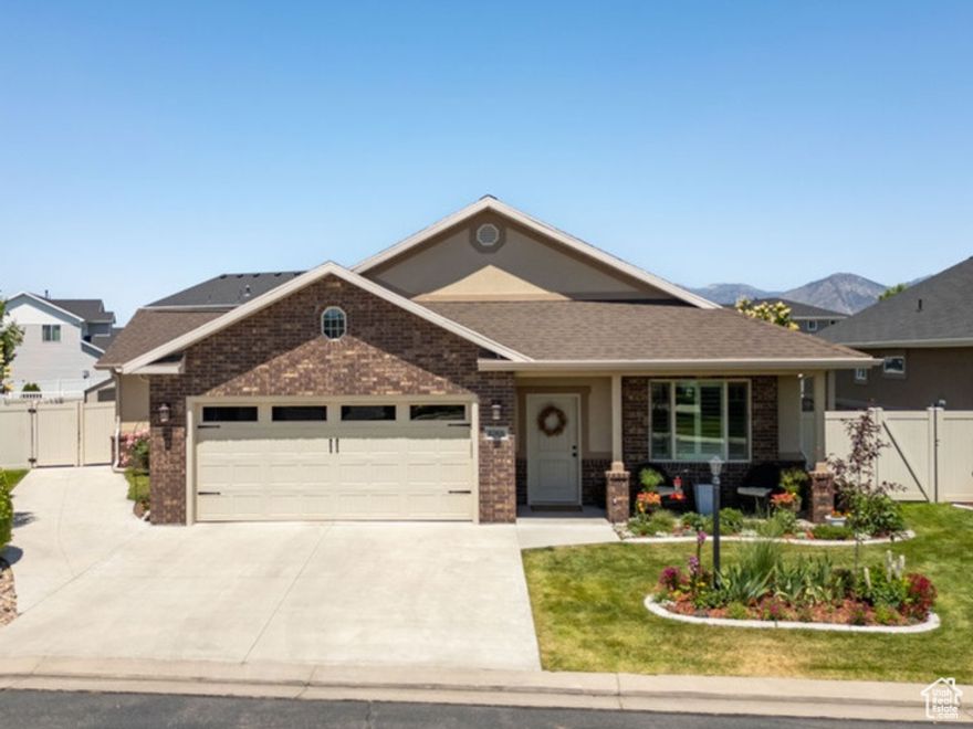 Custom built, beautifully updated, single level home in Nibley's Sunset Park 55+ quiet retirement community.  Large open floor plan with 36" door ways on most doors.  9' Ceilings, vaulted ceiling in living room, tray ceilings in office and master bedroom.  Granite countertops, plantation shutters, upgraded carpet & LVT/LVP flooring.  Large family  room with great natural light, floor to ceiling rock fireplace, and built in shelves.  Large Kitchen/Dining area with plenty of storage and counter space.  Several large closets with built in shelving.  Water softener and high efficiency furnace.  Beautiful established landscape, 2 patios, storage shed, fully fenced.  Square footage provided as reference only.  Buyer to verify all details.  Agent is Seller.