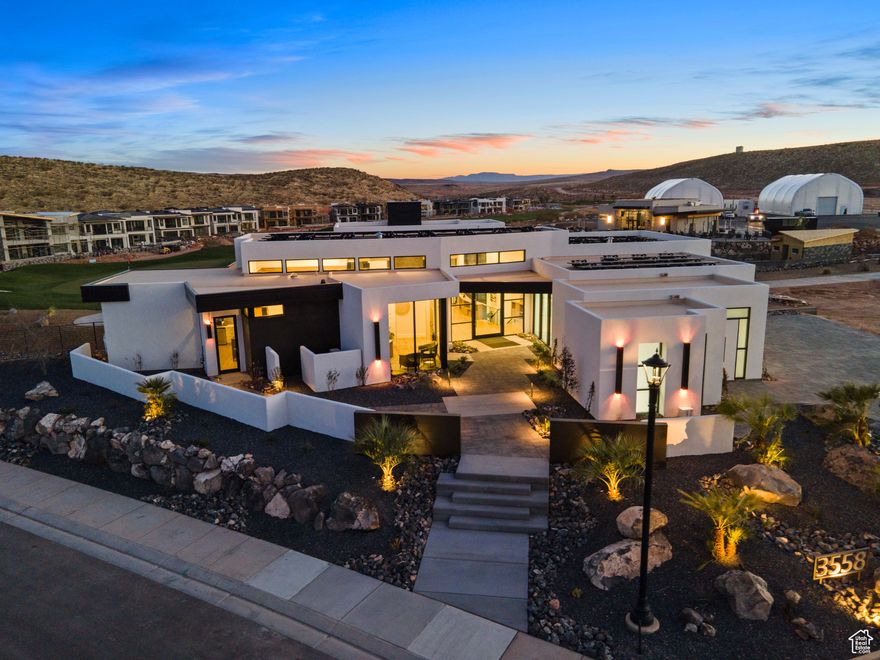 Massive price reduction! Luxury meets comfort with this beautiful, former Parade of Homes dream home or vacation rental property. Professionally decorated and fully furnished, built by award winning Richardson Brothers Custom Homes. Featuring a fully stocked gourmet kitchen, open and airy floor plan with floor to ceiling windows, large dedicated workspace, attached casita with kitchenette, and two large gathering spaces with additional kitchenette in the basement. Set on Copper Rock Golf Course with stunning views with the Championship 18th hole. An entertainer's dream with an outdoor firepit and BBQ area, heated pool and spa, putting green, and spacious deck and patio spaces. The master ensuite has double sinks, a soaking tub, walk-in shower and closet and private deck. Enjoy quiet nights and views with outdoor sitting on both levels. Basement bedrooms have pool access, and a full additional bathroom is found outside by the pool. Ample parking in the impressive, fully finished 4 car garage. Online bookings boast high guest ratings, currently set up to sleep 14 guests with 4 King beds, 2 Double bunk-beds and sofa sleeper. Close proximity to Zions National Park (30 minutes) and Sand Hollow State Park and Reservoir (15 minutes) for all your hiking, biking, sightseeing, boating, camping, fishing and recreational vehicles wants and needs. All appliances, furniture, decor and household goods are included!