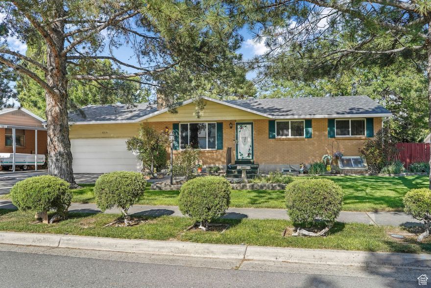 Incredible rambler with so many updates including the kitchen featuring granite counters, stainless appliances and an amazing island. There is new carpet and paint on the main floor and a back yard designed for entertaining or enjoying the summer days that includes a large covered deck, stone patio, waterfall, horse shoe pits, fully finished shed/ playhouse and a huge garden area! The basement features a large main suite with huge walk in closet, a den with built in desk, wet bar and excellent living rooms space perfect for movie or game night! The garage also features a built in workshop, access to the garage and RV Parking off to the side.  Square footage figures are provided as a courtesy estimate only and were obtained from county records .  Buyer is advised to obtain an independent measurement.
