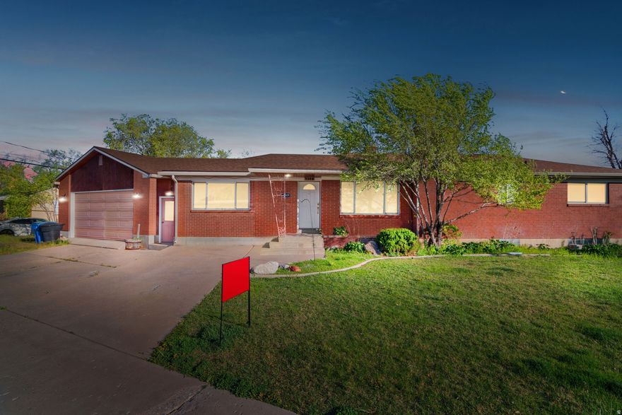 Prime Location & Classic Charm! All-Brick Beauty Steps from USU  Location, location, location! Whether you are looking for an incredible investment property or a place to call home right next to the action, this solid all-brick gem is situated within easy walking distance to Utah State University.  Inside, you are welcomed by an inviting main floor anchored by a cozy fireplace. The kitchen has been tastefully updated to meet modern demands, showcasing beautiful granite countertops and sleek stainless steel appliances. When it is time to unwind, retreat to the remodeled bathroom, which features a luxurious soaker tub and custom shower surround.  The layout maximizes both function and entertainment with a fantastic walkout basement. This lower level is an entertainer's dream, complete with its own wet bar and easy access to the backyard.