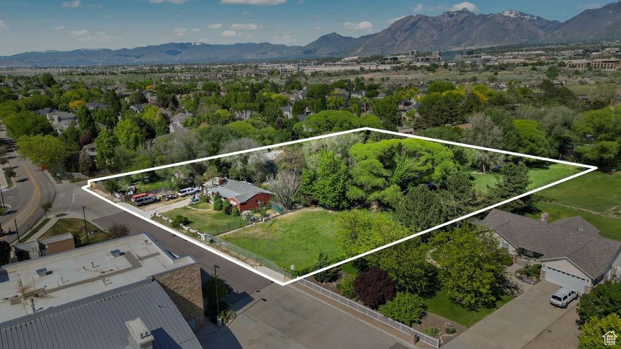 Square footage figures are provided as a courtesy estimate only and were obtained from County records.  Buyer is advised to obtain an independent measurement. Property currently has an additional 20X60 Separate garage with car lift. The home may be a tear down. The value is in the property. Buyer is looking for a builder to rezone the property for commercial use. Two tax ID #s are included for a total of 2.64 Acres. Tax ID 27-14-251-026=.96 Acres. Tax ID 27-14-251-027=1.68 Acres.Square footage figures are provided as a courtesy estimate only and were obtained from tax data . Buyer is advised to obtain an independent measurement.