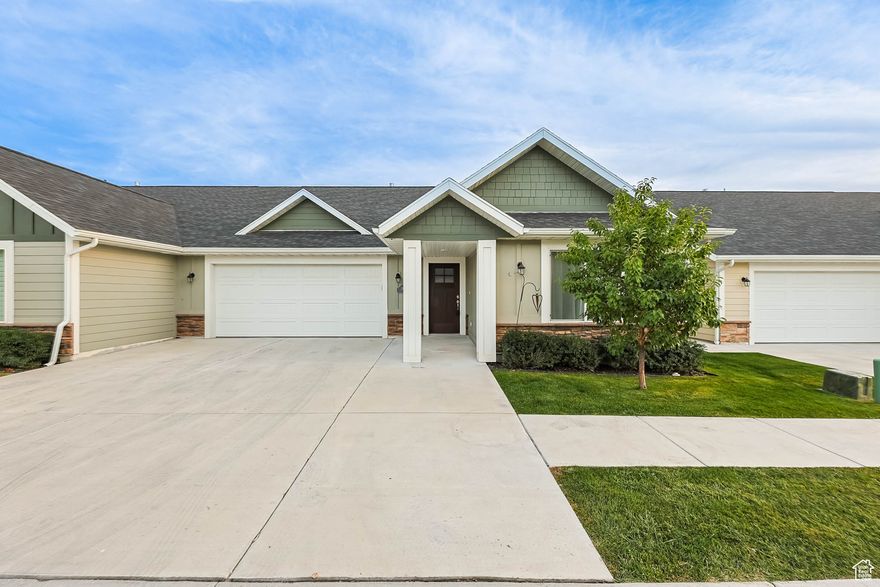 Welcome to easy living in this beautifully maintained 3-bedroom, 2-bathroom home, perfectly nestled in a peaceful and friendly 55+ community. Designed for comfort and ease, this home blends thoughtful upgrades with everyday functionality. Step into the open kitchen featuring a central island, pantry, and sleek stainless steel appliances which are included in the sale. With ample counter space and cabinetry, it's perfect for everything from quiet mornings to holiday meals.  The open-concept great room is bright and welcoming, featuring vaulted ceilings that add a sense of space and a cozy gas fireplace for year-round comfort. Large windows bring in natural light, creating an ideal setting for both relaxing and entertaining. Off the great room, you will find access to your own covered back patio perfect for quiet moments or gatherings with friends and family.  The primary suite offers a quiet retreat with a generous walk-in closet and a well-appointed en-suite bathroom, complete with double sinks. Two additional bedrooms provide flexible space for guests, hobbies, or a home office.  Enjoy the ease of single-level living, in a location that is just minutes from shopping, dining, medical facilities, and other daily essentials. This low-maintenance home offers the ideal mix of privacy, community, and convenience.  Don't miss your chance to enjoy the lifestyle you've been waiting for in a 55+ community. Schedule your showing today!