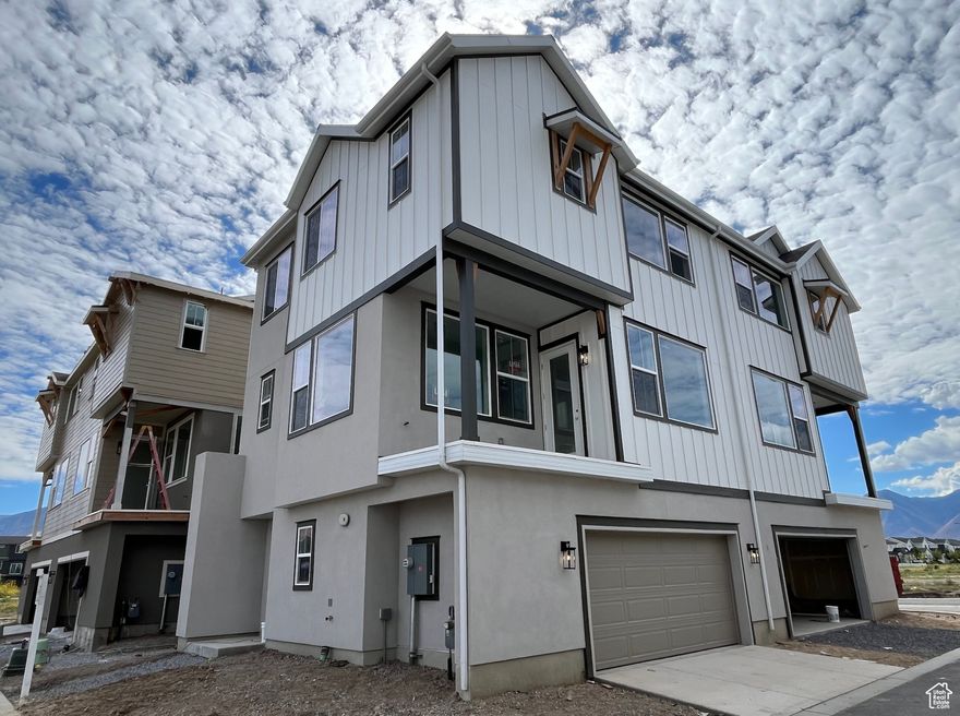 Up to $15,000 in seller paid closing costs or towards rate buydown!! Model home hours are Tuesday-Saturday from 10am-5pm, see video link for virtual tour or ask about our self guided tour option!This stunning 3-bedroom, 2.5-bath twin home nestled in one of Springville's most desirable neighborhoods. Step inside to discover an inviting open-concept layout featuring soaring 10-foot ceilings, an abundance of natural light, and a seamless flow between the kitchen, living, and dining areas-ideal for both everyday living and entertaining. The modern kitchen boasts elegant quartz countertops, stainless steel appliances, and a spacious island, while the dining area opens directly onto a private deck with amazing views. With only one shared wall and plenty of windows, this home feels more like a single-family residence, offering privacy and a bright, airy atmosphere throughout. Located just steps from a brand-new city park and surrounded by scenic walking trails, this home offers the perfect blend of convenience, comfort, and outdoor beauty! This unit is currently under construction, estimated completion mid-end October 2025.