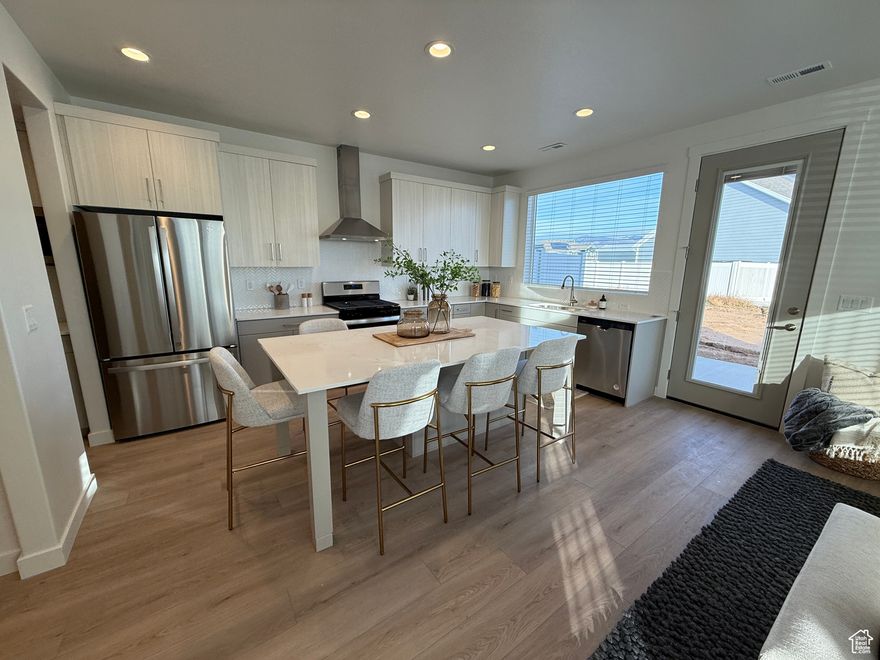 Price improvement on gorgeous townhome in prime location!!! Discover the modern design of this NEW townhome featuring sleek, contemporary architecture and spacious, open floor plan. You will not believe the open space behind this unit and the gorgeous mountain views! The HUGE kitchen has a stunning layout with Quartz countertops and Butler's pantry! Enjoy the luxury of oversized bedrooms, large back patio and 2-car garage. The community offers a wealth of amenities, including 7 miles of scenic walking trails, pickleball courts, picnic pavilions, playgrounds, and a community building. This home is packed with smart features for ultimate convenience and security, including Nest thermostat, Ring doorbell, digital front door lock, MyQ garage openers, and Alexa Echo devices-bringing modern living to your doorstep. Limited-Time Offer... AMAZING INCENTIVE...Receive $10,000+ toward closing costs and/or interest rate buy-down when using our preferred lenders. Call today for details! I can help you find the perfect townhome, even those not yet listed!