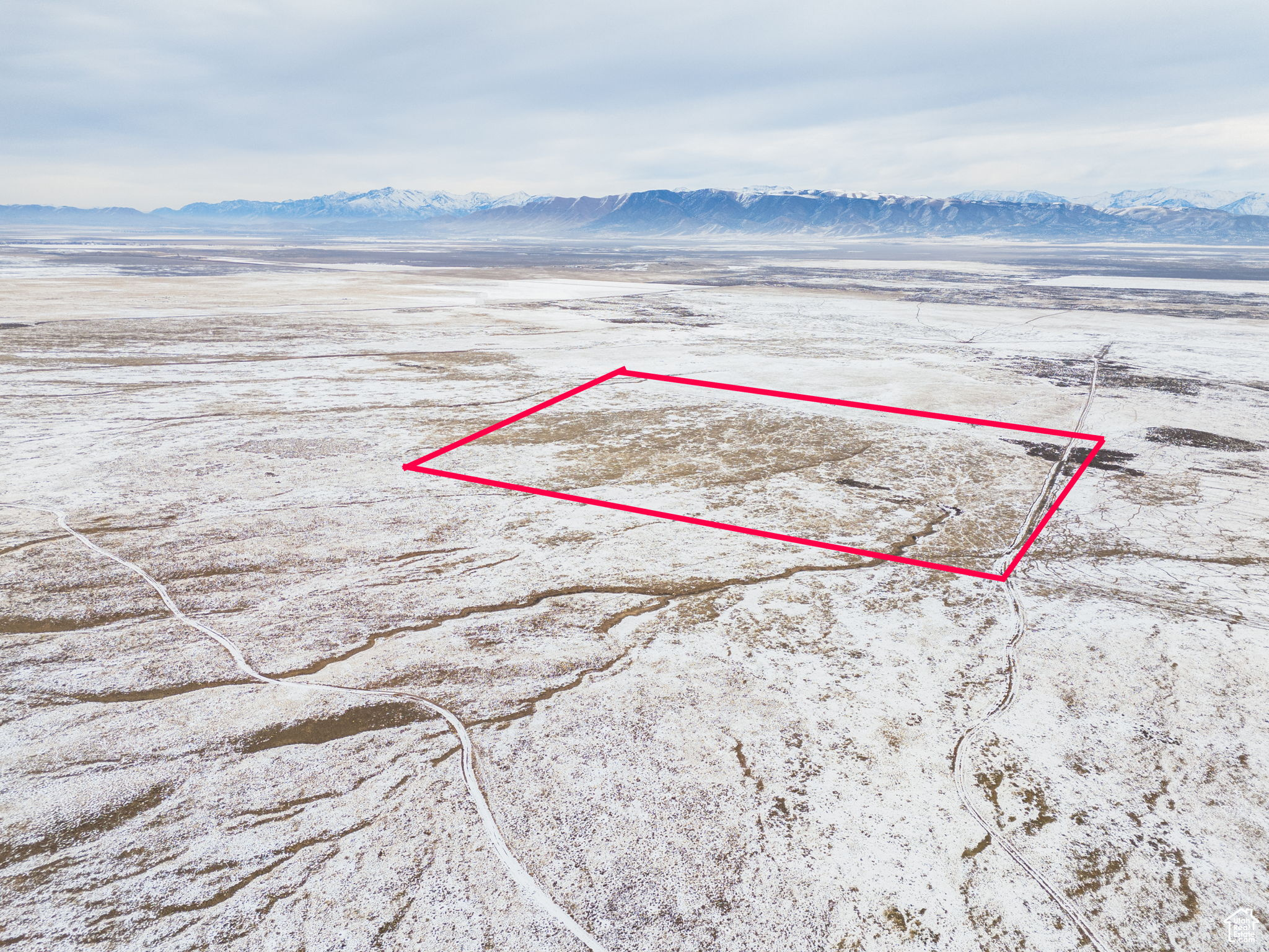 The suburban sprawl is inevitable in Utah County and this piece of land is likely to become part of the development. In the interim, you'll be able to enjoy the land, at a great price, recreationally or however you prefer. The intent is to sell these 40.5 acres with the adjacent 13.5 acres, MLS #2062779, which has BLM access on the west side.  All information, figures, and documentation provided as a courtesy, buyer to verify all information.  Directions: https://www.google.com/maps/place/40%C2%B011'24.0%22N+112%C2%B007'05.1%22W/@40.1900065,-112.1206558,17z/data=!3m1!4b1!4m4!3m3!8m2!3d40.1900065!4d-112.1180809?entry=ttu&g_ep=EgoyMDI1MDEyOS4xIKXMDSoASAFQAw%3D%3D