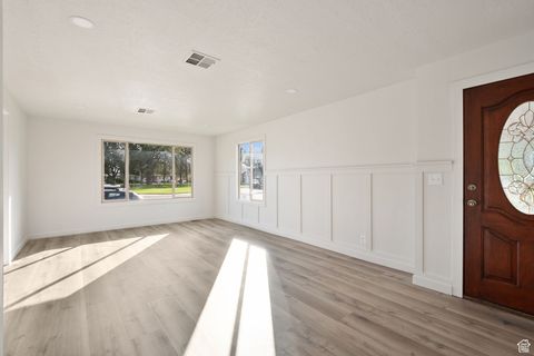 Photo of 1031 W FOXGLOVE Dr S, Taylorsville, UT 84123 (MLS # 2118029)