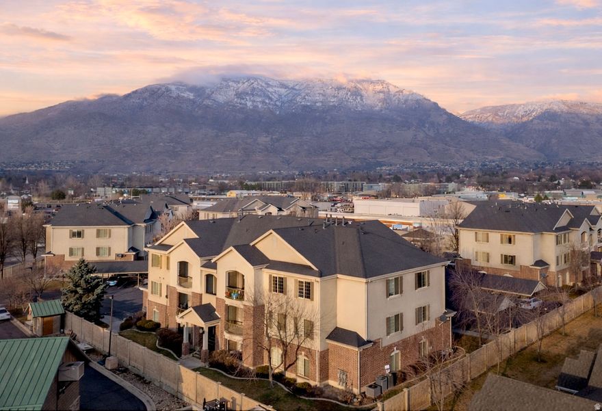 $10,000 buyer credit offered with a full price offer.   Top floor 3 bedroom 2 bathroom condo with beautiful mountain views in a prime Pleasant Grove location. Across the street from Macey's grocery store, restaurants, and more, and just minutes from the new Megaplex and I-15. This clean, vacant and move in ready unit features vaulted ceilings, great natural light, and a large kitchen with plenty of cabinet space, granite countertops, and a roomy dining area. The primary suite includes a walk in closet and private bathroom. Top floor means no neighbors above. The HOA covers valuable amenities including water, sewer, trash, snow removal, and more! Includes 1 covered parking stall plus lots of nearby parking. Use the $10,000 credit however you choose. It could go toward new carpet, kitchen sink updates, interior paint, closing costs, or a rate buy-down. Square-footage figures are provided as a courtesy estimate only.